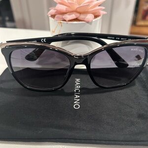 Marciano Black and Silver Sunglasses
Style GM0745
With cloth case
Like NEW